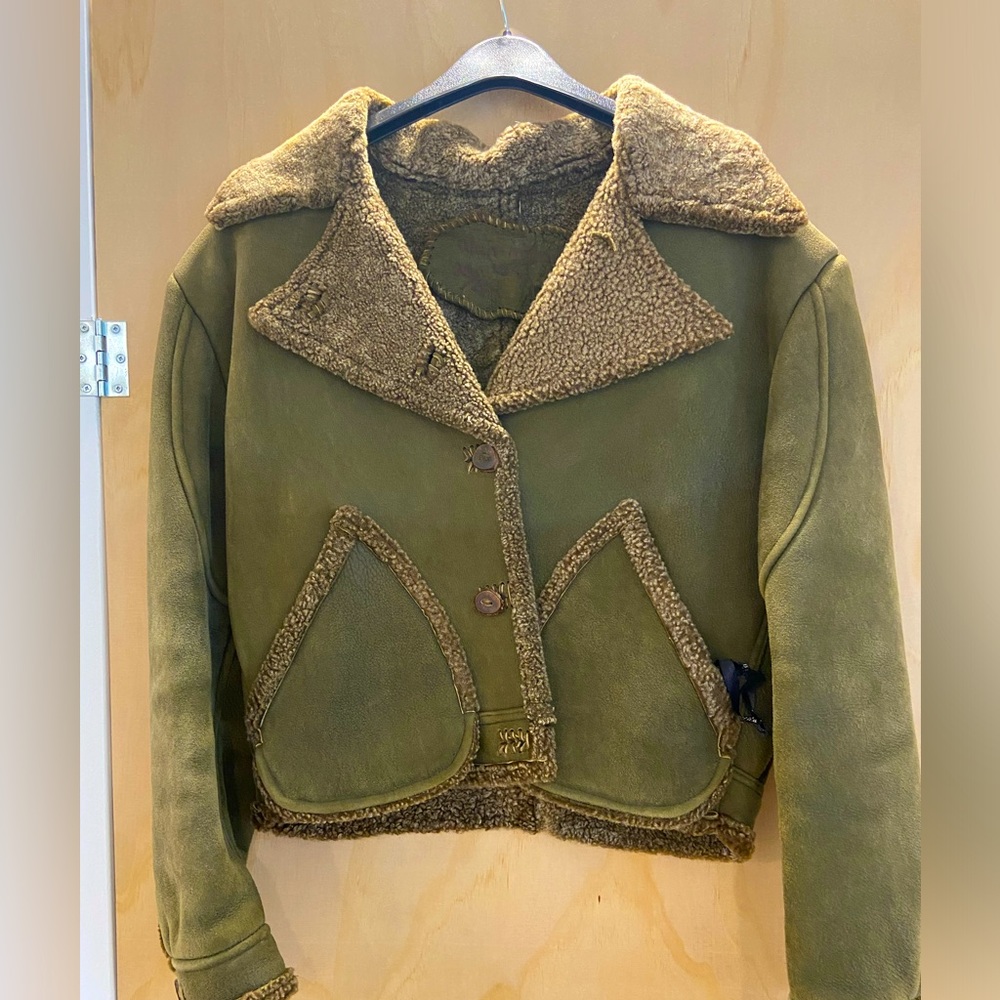 Hand sewn suede, shearling, handmade buttons, everything made by hand